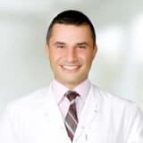 Op. Dr. Akgün Sayar